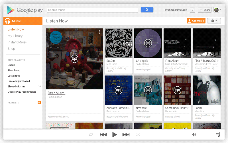 The Google Play Music web player, where a song file is dragged from the desktop onto the library grid and uploaded.